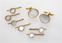 8 Pc. 14K gold and mother of pearl dress set,