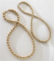 (2) 14K yellow gold bead necklaces: (1) Tiffany