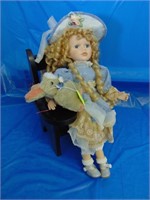 Porcelain Doll With Bunny In School Chair