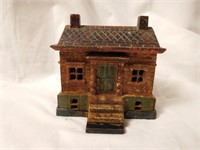Painted cast iron bank building coin band