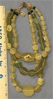 3 strand variegated sized green bead necklace    (