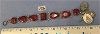 Approx. 8" bracelet, faceted raw rubies in silver