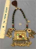 Approx. 16-18" necklace, has raw jade and rubies,