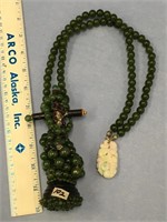 Approx. 20 1/2" long jade bead necklace, crucifix