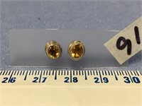 Choice on 3; Pair of citrine and silver tone stud
