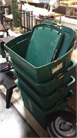 Set of four dark green tubs with matching lids,