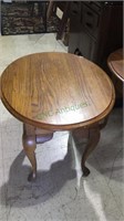 Oval top side table with Queen Anne style legs and