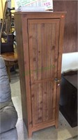 Tall and narrow one door cabinet with four