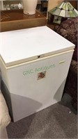 Small size white household freezer by chest