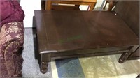 Brown painted wood coffee table with lift up
