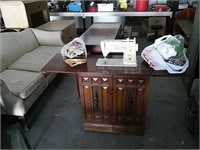 Singer Sewing Machine in Cabinet with Sewing acs.