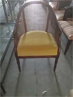 Gold fabric with brown wooden frame chair