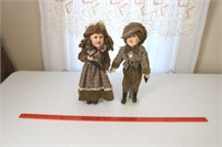 Boy and Girl Caroler Dolls
