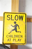 SLOW CHILDREN AT PLAY SIGN AND PLASTIC