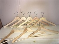Set of 8 natural wood hangers