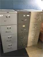 3 large metal filing cabinets