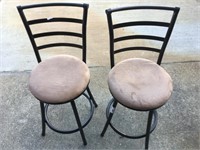 Two swivel bar stools