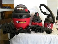 3 shop vacuums with assorted attachments