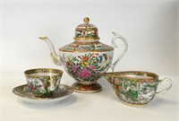 Four Pcs of Chinese Rose Medallion Teapot & Saucer