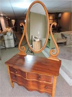 Antique dresser with swing mirror