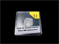 1875-CC Seated Liberty dime, above bow