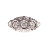 An Art Deco Platinum Diamond Filigree Ring