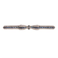 An Art Deco Platinum Sapphire & Diamond Bow Pin