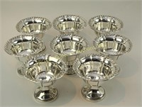 EIGHT STERLING MOUNTED DESSERT BOWLS