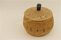 WOVEN GRASS BASKET WITH WALRUS HEAD FINIAL