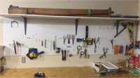 Items on pegboard and quilting shelf