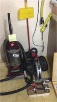 Upright Hoover sweeper, weights, exercise wheel,