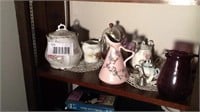 Shelf with pink Hull pitcher  and contents
