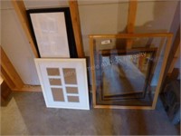 Lot of picture frames and mirror