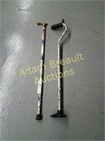(1) Brass & (1) aluminum walking canes