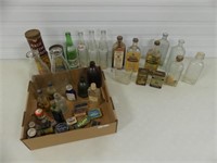 BOX- MISC. BOTTLES, TINS & GLASS MEASURING CUP