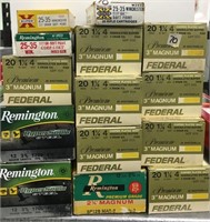 14 boxes of assorted 25/35 rifle cartridges and 12