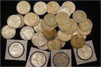 Thirty-five Canadian silver dollars, 1952-1966