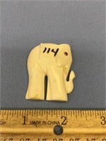 Ivory elephant 2" tall with ruby eye faceted in 14