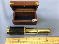Small brass telescope with a hardwood box with inl