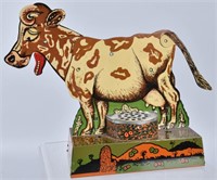 TIN MOOING COW TOY