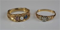 Two gold rings set w/ a diamond & mixed stones,7g.