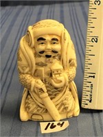 3" carved bone Chinese man, signed        (g 22)