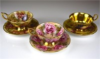 Three Aynsley fruit & floral cups and saucers