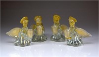 Four Murano glass angel form candle holders