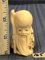 2.5" Confucius carving, signed        (g 22)