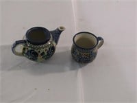 Flower painted tea pot and cup