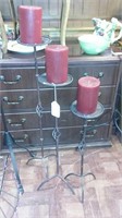 Set of 3 candle stands with candles