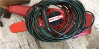 Homelite XL chainsaw with case and extension cords