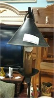 Tall metal standing lamp