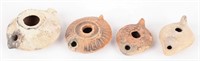 4 POTTERY OIL LAMPS